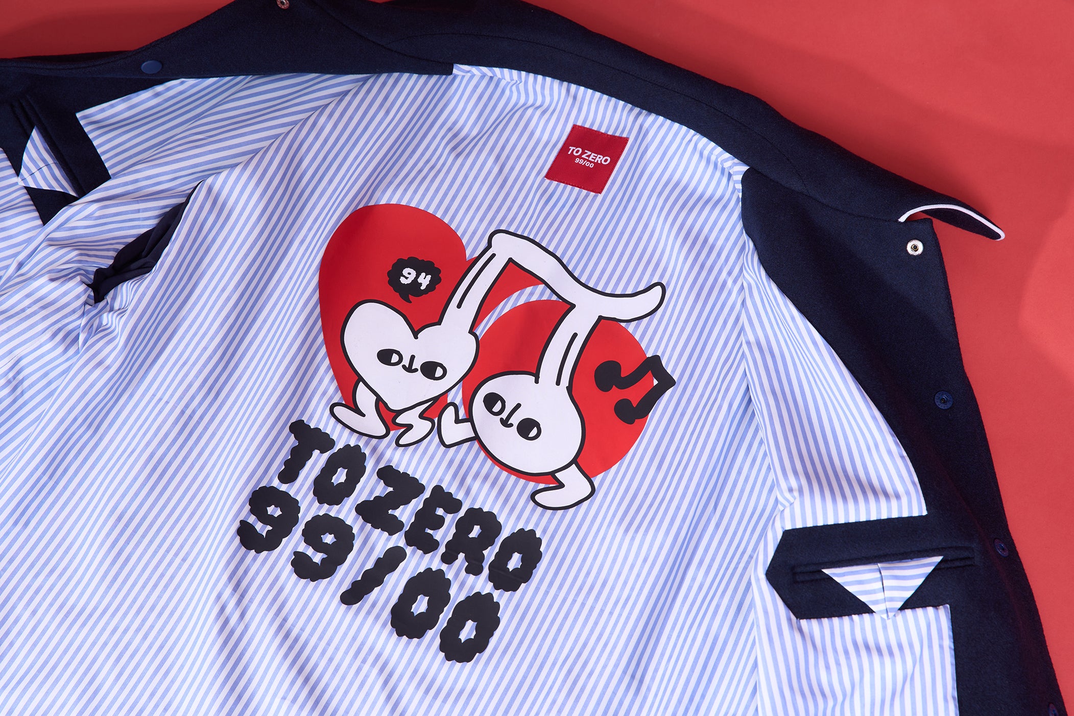 TO ZERO 'MUSIC UNION' FLOCK PRINT COACH JACKET