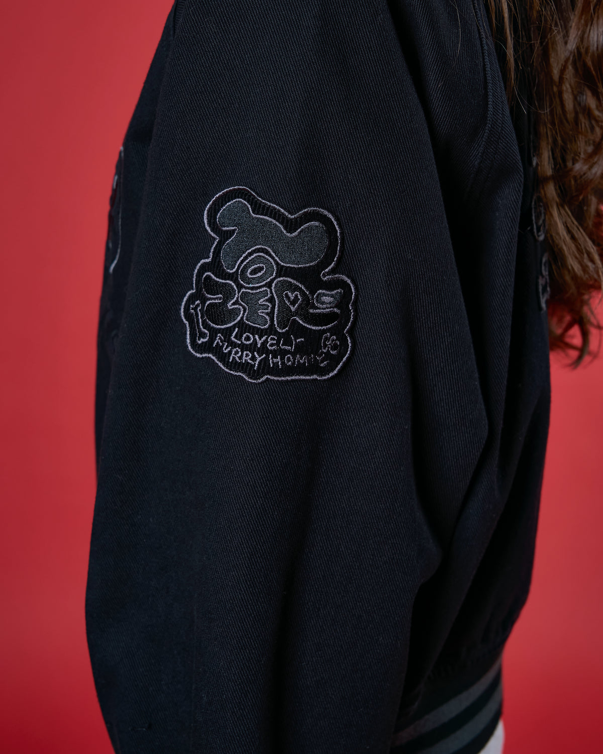 'LOVELY FURRY HOMIE' VARSITY JACKET (BLACK)
