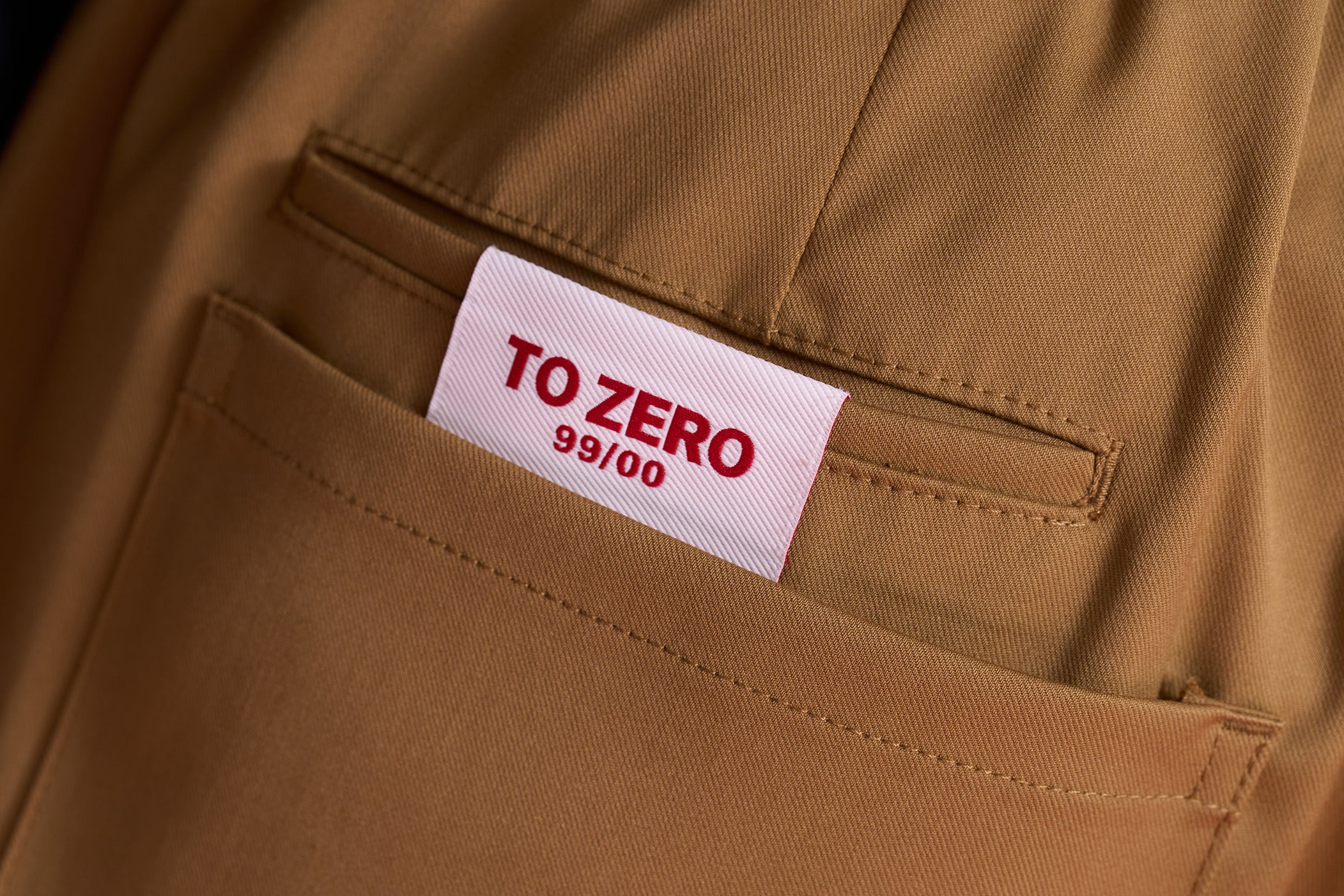 TO ZERO GUITAR PICK & LEATHER POUCH FLARE PANTS (SAND)