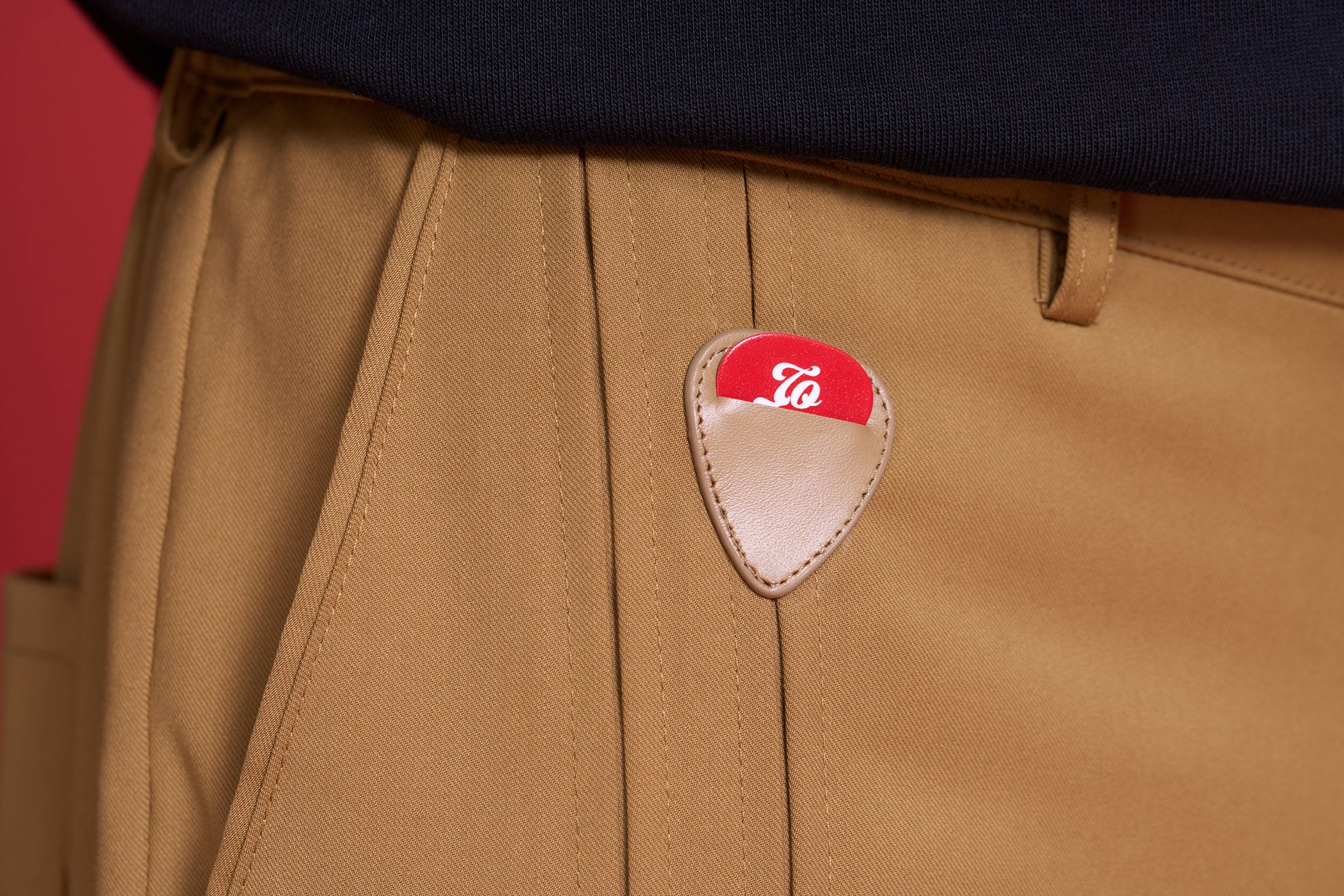 TO ZERO GUITAR PICK & LEATHER POUCH FLARE PANTS (SAND)